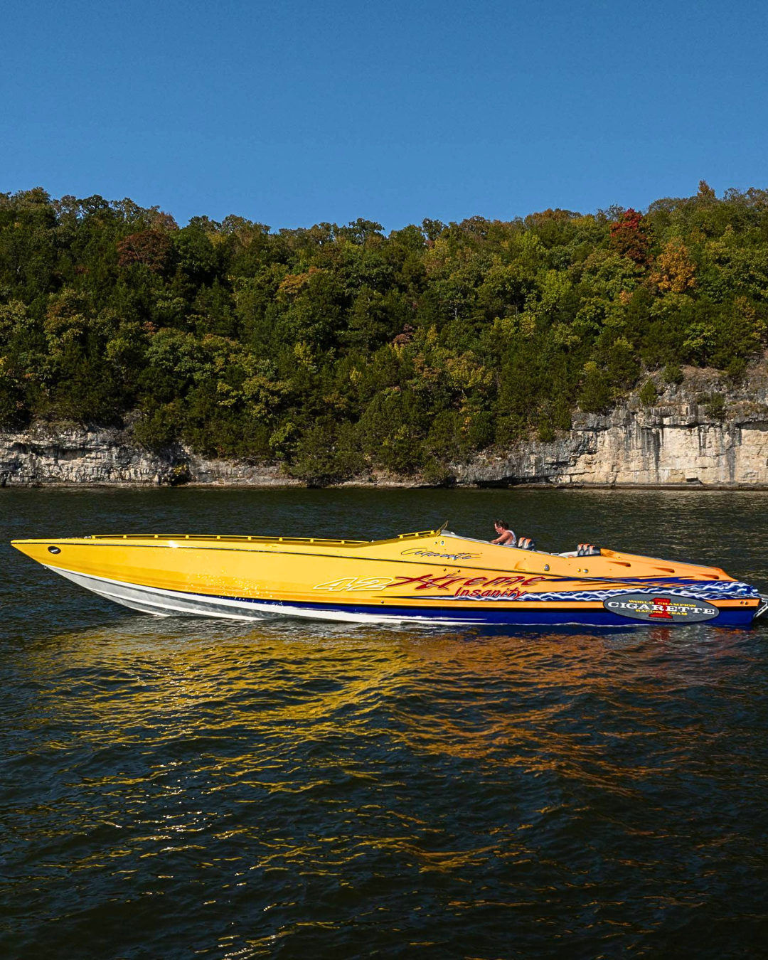 Yellow speed boat lake ozarks